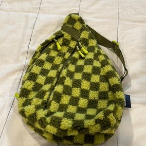 Green checkered sling bag